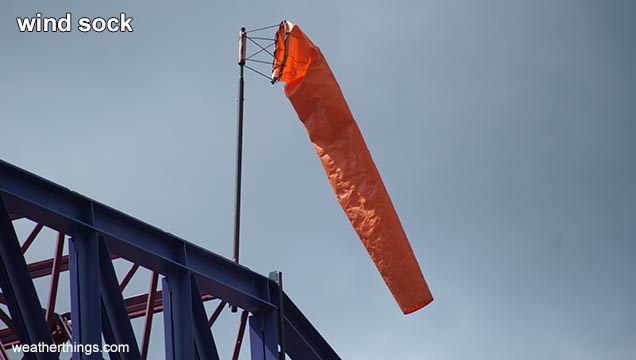 orange fabric tube in wind